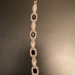7.5 inch silver and black stone Bracelet with cut diamonds.